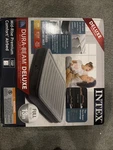 Intex 67767EP Dura Beam Plush Mid Rise Airbed With Built-in Pump. Fixed Price $48.99.