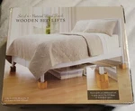 Wooden Lifts Natural Set Of 4 (bed,bath,& Beyond). Fixed Price $15.99.