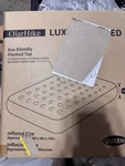 New Olarhike Queen Size Luxury Air Bed Inflatable 80X60X13 High Flocked Top Nib. Fixed Price $45.00.