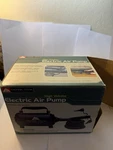 Ozark Trail Electric Air Pump High-volume, Quick-fill Portable Inflatable 58627. Fixed Price $10.00.