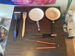 Bbq Cleaning Brush, Tongs, And Stove Top Pans Set Of Dishes. Fixed Price $60.00.