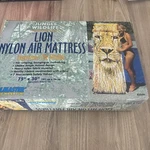 Poolmaster Lion Nylon Air Mattress 83566. Fixed Price $30.00.