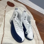 Jordan Air 12 Retro French Blue White High Top Lace-up Sneakers. Fixed Price $100.00.