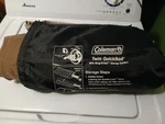 Used Coleman (74 X 39 5) Tan Twin Quickbed W. Wrap Roll Storage System. Fixed Price $25.00.