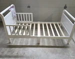 White Delta Wood Toddler Bed Frame W/ Guardrails. Fixed Price $40.00.