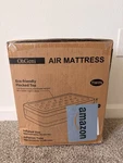 Ohgeni Twin Air Mattress Built-in Pump Soft Flocking Top 18" White Black. Fixed Price $43.32.