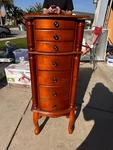 Coaster Jewelry Armoire In Warm Brown And Antiqued Hardware. Fixed Price $300.00.