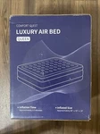 Comfort Quest Queen Air Mattress With Built-in Pump Guest. Fixed Price $53.19.