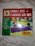 Northwest Territory Single Flocked Air Bed 33X74. Fixed Price $12.95.