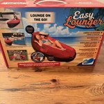 Compact Inflatable Lounger Chair - Easy Inflation & Stylish Outdoor Accessory. Fixed Price $50.00.