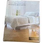 Wooden Bed Lifts Natural Finish Set Of 4. Fixed Price $25.00.