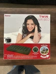 Adventuridge Twin Size Air Mattress With Pump, 74"X39"X8.5". Fixed Price $14.95.