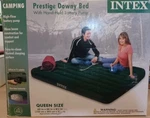New Intex Queen Size 60"X80"X8.75" Prestige Downy Bed W/hand Held Battery Pump. Fixed Price $39.88.